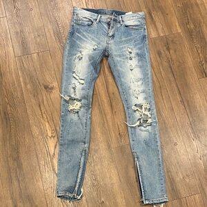 Distressed Light Blue Jeans